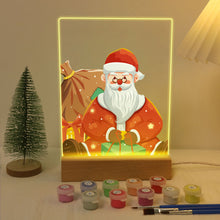 Carica l&#39;immagine nel visualizzatore di Gallery, Dipingere con i numeri - Supporto in legno con luce LED 15x20cm - Babbo Natale 09