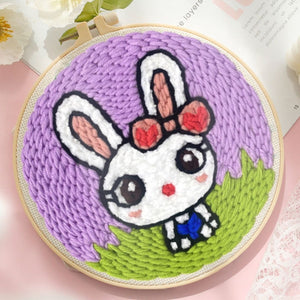Punch Needle Coniglio con fiocco rosso