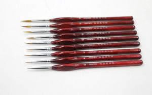Set di 9 pennelli professionali in legno rosso